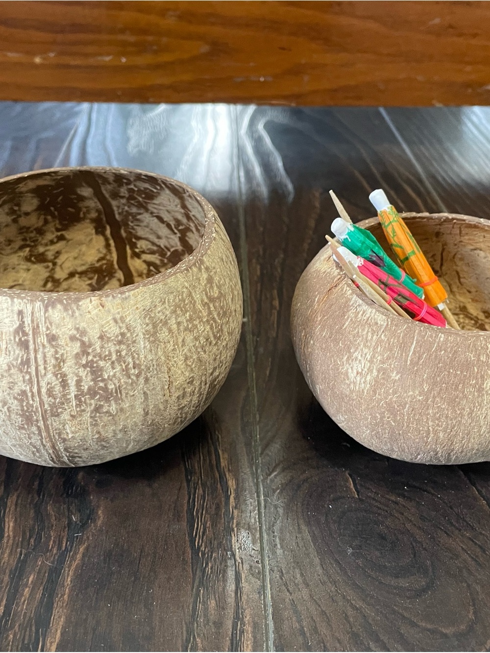Set of Two Natural Coconut Shell Bowls - Light Brown with Paper Drink Umbrellas